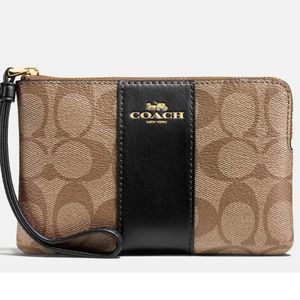 Coach Corner Zip Wristlet In Signature Canvas